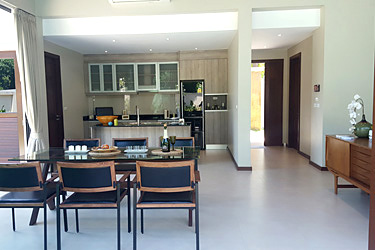 Kitchen, Living Area and Welcome Hall with Pool and Garden View